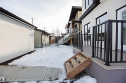 View of yard covered in snow - 