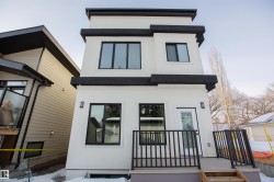 Rear view of property with stucco siding and a patio - 