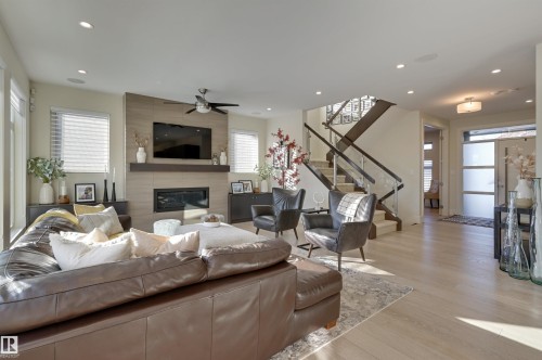805 Drysdale Run Run, Edmonton, AB - Indoor Photo Showing Living Room With Fireplace