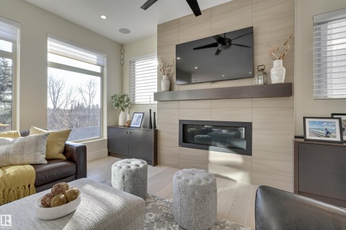 805 Drysdale Run Run, Edmonton, AB - Indoor Photo Showing Living Room With Fireplace