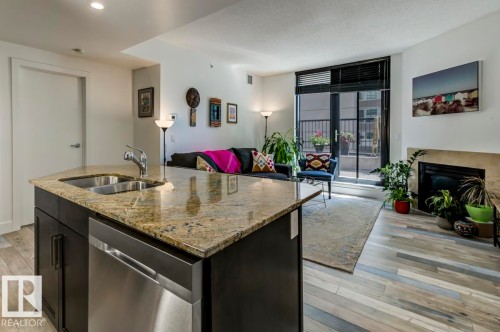 205 11933 Jasper Avenue, Edmonton, AB - Indoor With Fireplace