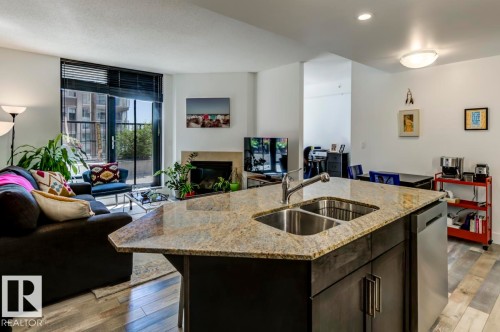 205 11933 Jasper Avenue, Edmonton, AB - Indoor Photo Showing Kitchen With Double Sink