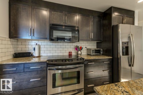 205 11933 Jasper Avenue, Edmonton, AB - Indoor Photo Showing Kitchen With Upgraded Kitchen