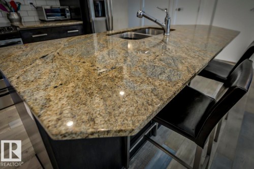 205 11933 Jasper Avenue, Edmonton, AB - Indoor Photo Showing Kitchen With Double Sink With Upgraded Kitchen