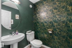 Bathroom with toilet and baseboards - 