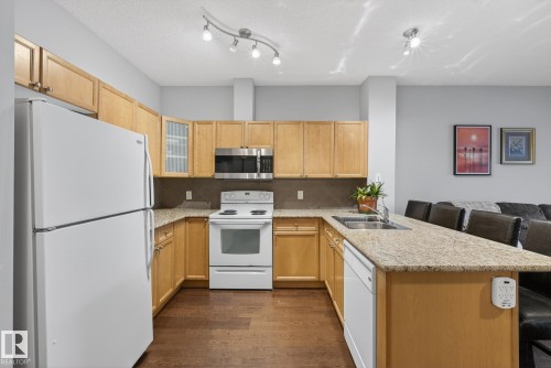 111 226 Macewan Road, Edmonton, AB - Indoor Photo Showing Kitchen With Double Sink