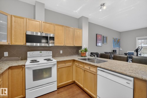111 226 Macewan Road, Edmonton, AB - Indoor Photo Showing Kitchen With Double Sink
