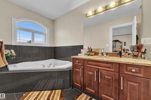 Full bathroom with vanity, a garden tub, and tile patterned floors - 2012 69 Street, Edmonton, AB - Indoor Photo Showing Bathroom