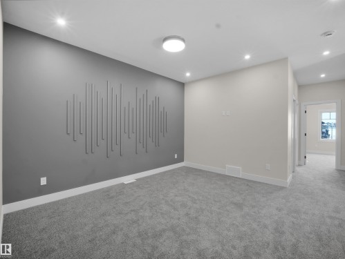 Spare room with recessed lighting and light carpet - 46 Waverly Way, Fort Saskatchewan, AB - Indoor Photo Showing Other Room