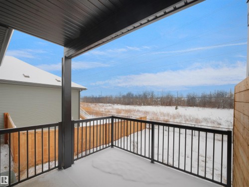 View of snow covered back of property - 46 Waverly Way, Fort Saskatchewan, AB - Outdoor With Exterior