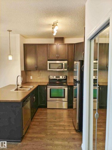 430 7825 71 Street, Edmonton, AB - Indoor Photo Showing Kitchen With Double Sink
