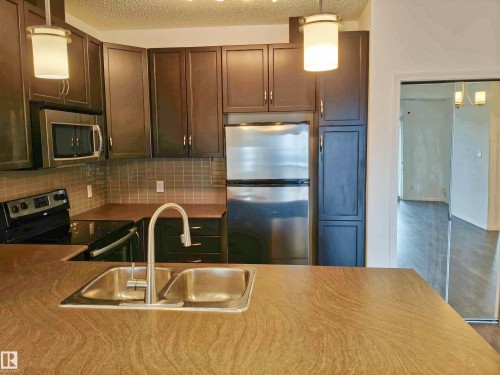 430 7825 71 Street, Edmonton, AB - Indoor Photo Showing Kitchen With Double Sink