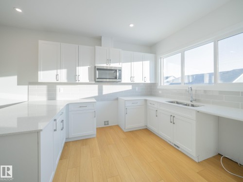 17635 70 Street, Edmonton, AB - Indoor Photo Showing Kitchen With Double Sink