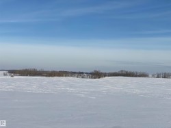 View of yard covered in snow - 