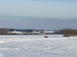 View of yard layered in snow - 