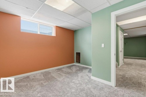 Basement featuring a drop ceiling and carpet flooring - 2 Wingate Way, Fort Saskatchewan, AB - Indoor