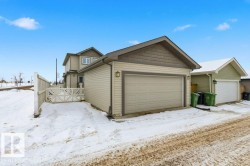 View of front facade with a garage - 