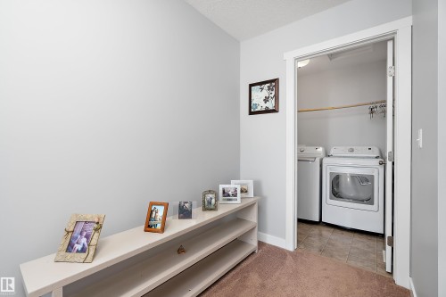 2 300 Queen Street, Spruce Grove, AB - Indoor Photo Showing Laundry Room