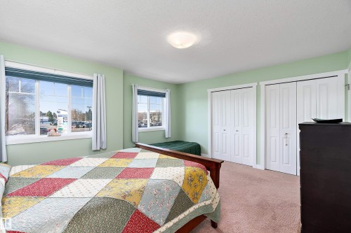 2 300 Queen Street, Spruce Grove, AB - Indoor Photo Showing Bedroom