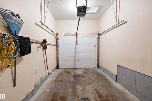 2 300 Queen Street, Spruce Grove, AB - Indoor Photo Showing Garage