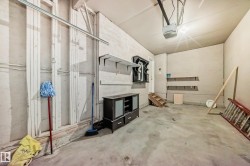 Garage featuring a garage door opener - 