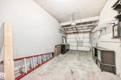 Garage featuring a garage door opener - 