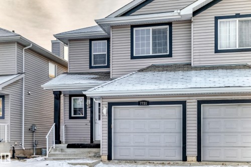 Traditional home featuring an attached garage - 7731 8 Avenue, Edmonton, AB - Outdoor With Exterior