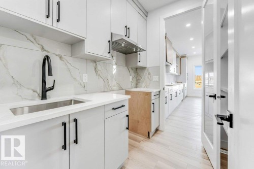 2408 63 Avenue, Rural Leduc County, AB - Indoor Photo Showing Kitchen With Upgraded Kitchen