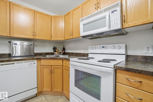 219 309 Clareview Station Drive, Edmonton, AB - Indoor Photo Showing Kitchen With Double Sink