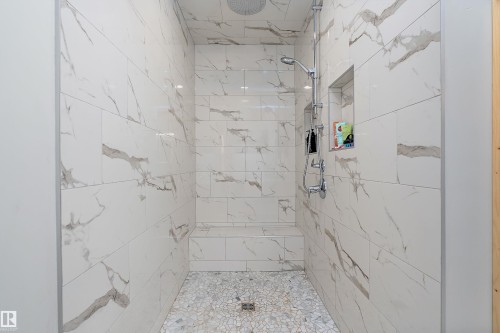 Full bath with a marble finish shower - 19003 Twp Rd 522, Rural Beaver County, AB - Indoor Photo Showing Bathroom