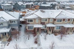 Snowy aerial view with a residential view - 