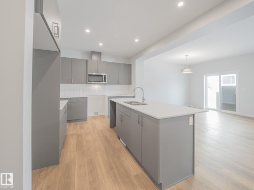 4631 Kinsella Landing, Edmonton, AB - Indoor Photo Showing Kitchen With Double Sink With Upgraded Kitchen