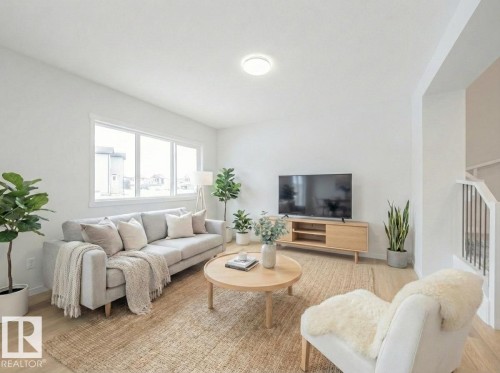 4631 Kinsella Landing, Edmonton, AB - Indoor Photo Showing Living Room