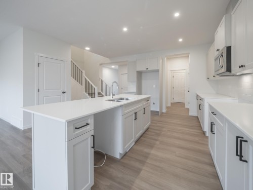 289 Rancher Road, Ardrossan, AB - Indoor Photo Showing Kitchen With Double Sink