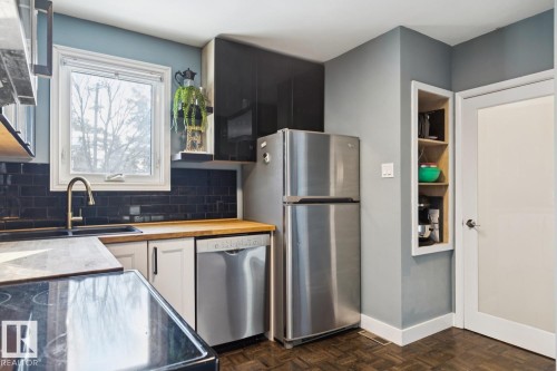 7601 91 Avenue, Edmonton, AB - Indoor Photo Showing Kitchen With Double Sink