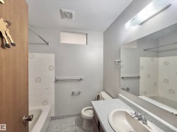 Full bath featuring tub / shower combination and vanity - 