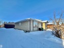 Snow covered property featuring stucco siding - 2112 104B Street, Edmonton, AB  - Outdoor 