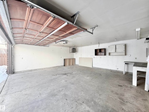 Garage featuring a heating unit - 2112 104B Street, Edmonton, AB - Indoor Photo Showing Garage