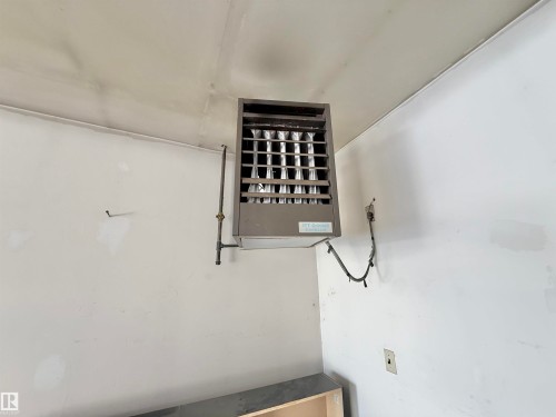 Detailed view of a heating unit - 2112 104B Street, Edmonton, AB - Indoor Photo Showing Other Room