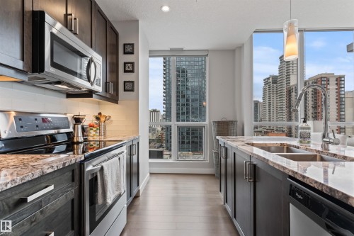 1107 10238 103 Street, Edmonton, AB - Indoor Photo Showing Kitchen With Stainless Steel Kitchen With Double Sink With Upgraded Kitchen