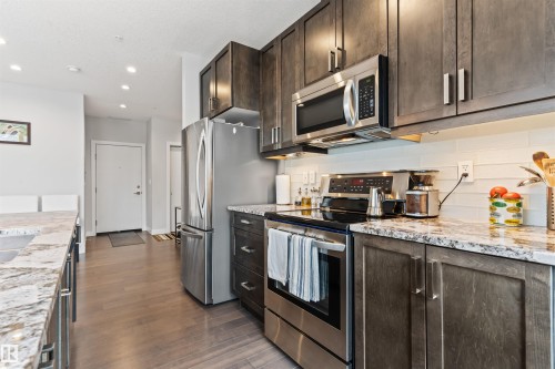 1107 10238 103 Street, Edmonton, AB - Indoor Photo Showing Kitchen With Stainless Steel Kitchen With Upgraded Kitchen