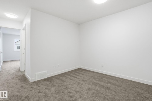 19 5122 213A Street, Edmonton, AB - Indoor Photo Showing Other Room