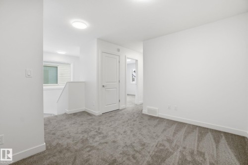 19 5122 213A Street, Edmonton, AB - Indoor Photo Showing Other Room