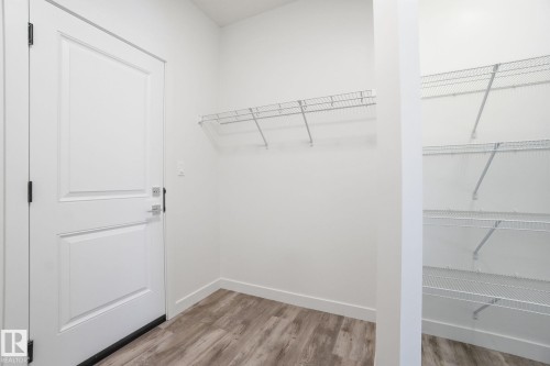 5 5122 213A Street Nw, Edmonton, AB - Indoor With Storage