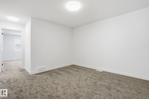 5 5122 213A Street Nw, Edmonton, AB - Indoor Photo Showing Other Room