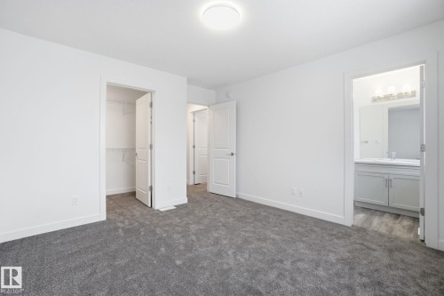 5 5122 213A Street Nw, Edmonton, AB - Indoor Photo Showing Other Room