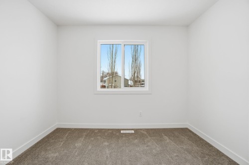 5 5122 213A Street Nw, Edmonton, AB - Indoor Photo Showing Other Room