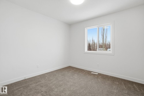 5 5122 213A Street Nw, Edmonton, AB - Indoor Photo Showing Other Room
