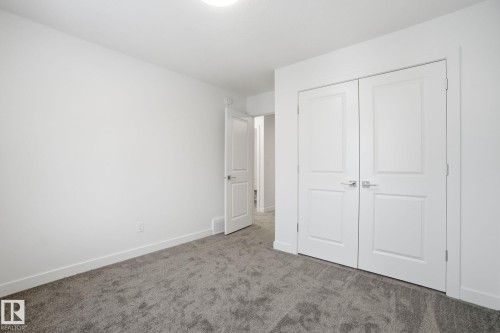 5 5122 213A Street Nw, Edmonton, AB - Indoor Photo Showing Other Room