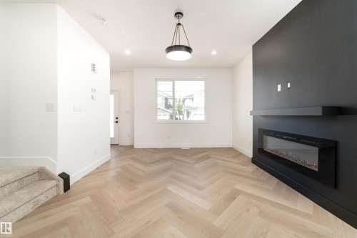 3127 Magpie Way, Edmonton, AB - Indoor Photo Showing Living Room With Fireplace